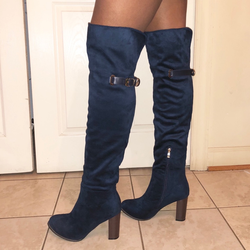 Navy over the knee boots with gold accents.